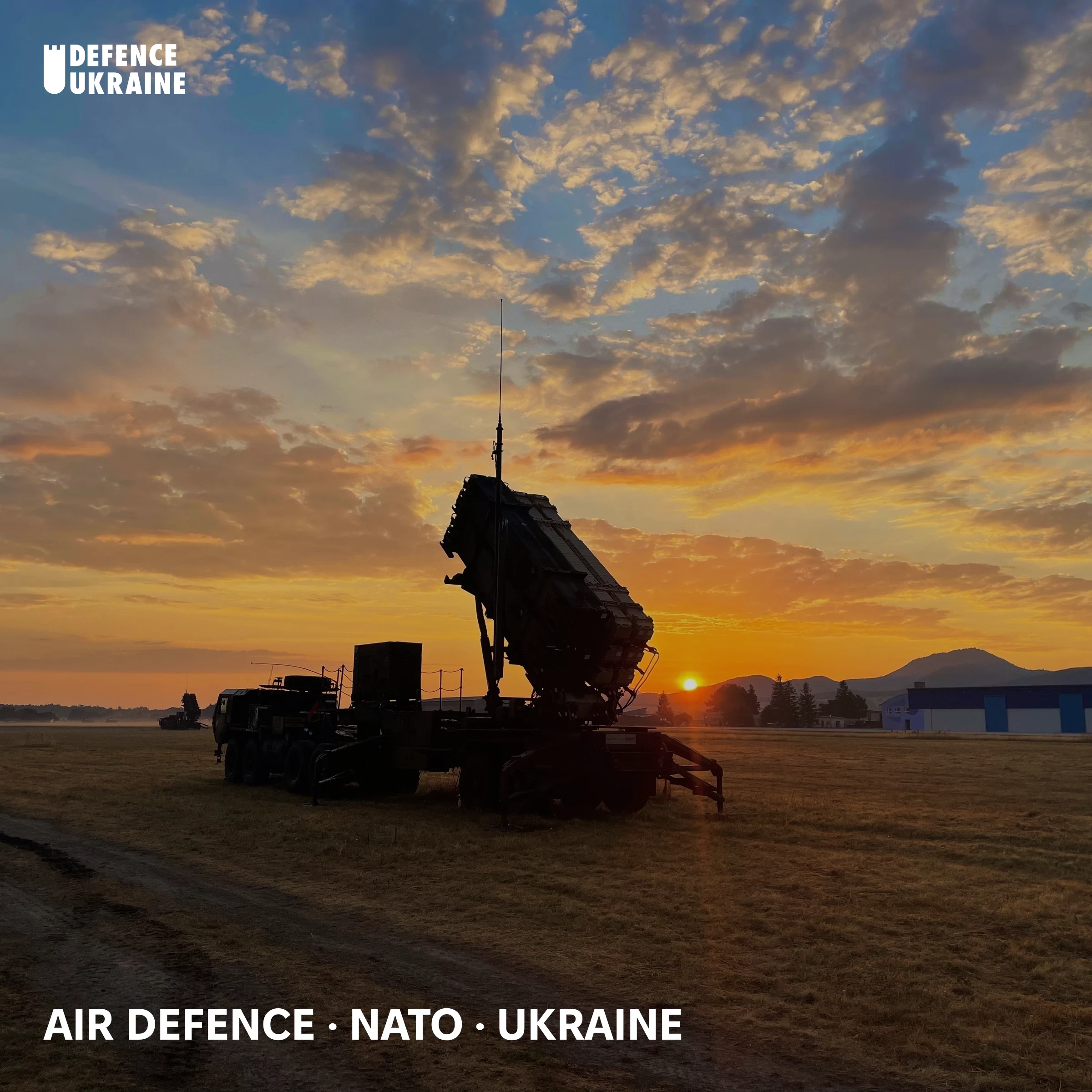 A US Army Patriot missile launcher silhouetted against a Slovak sunrise during NATO Eastern Flank deployment, the system at the centre of Ukraine's air-defence supply crisis.