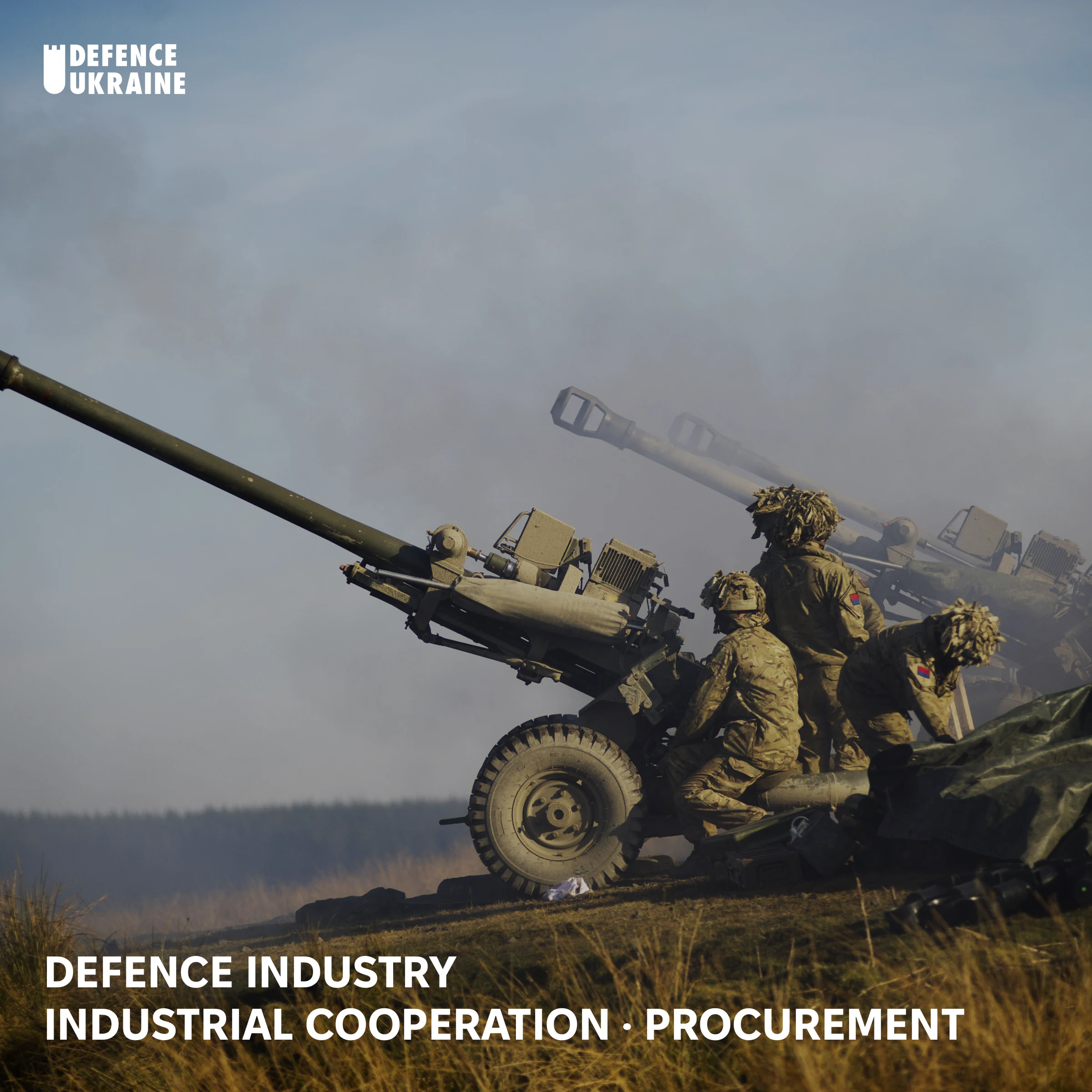 Royal Artillery crews fire two L118 105 mm light guns on a moorland range, the towed gun whose L119 variant BAE Systems has licensed for production in Ukraine.